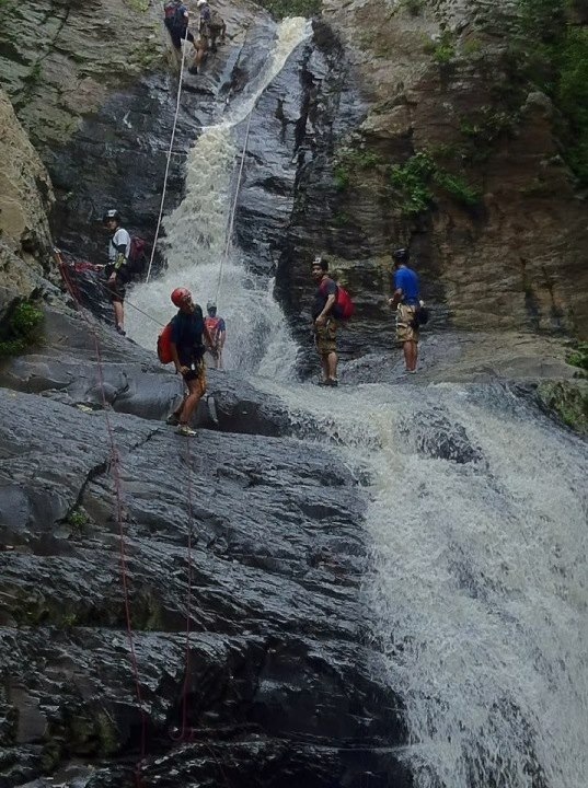 Rappelling on waterfalls